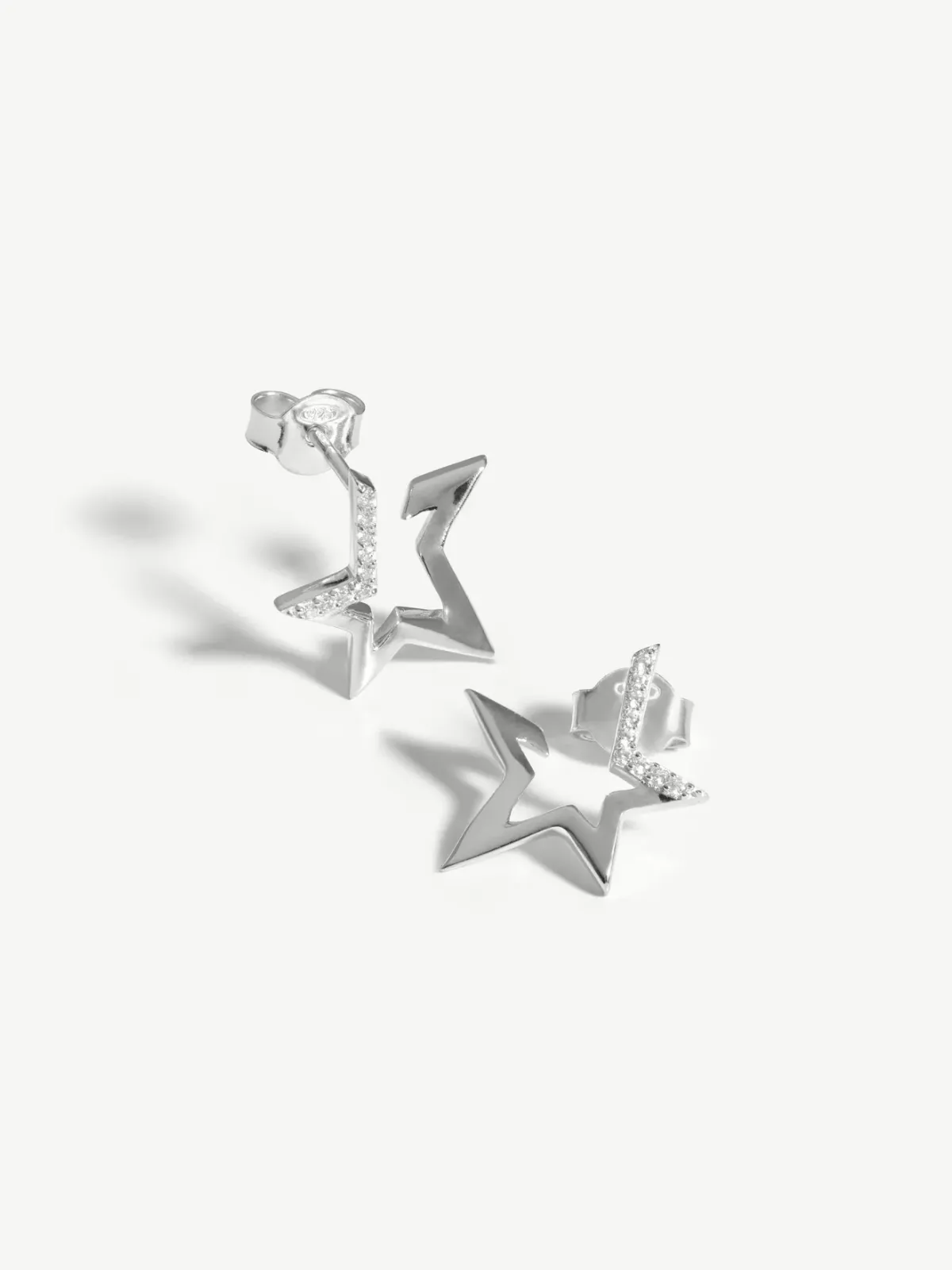 Missoma jewellery design, celestial pave star huggies earrings