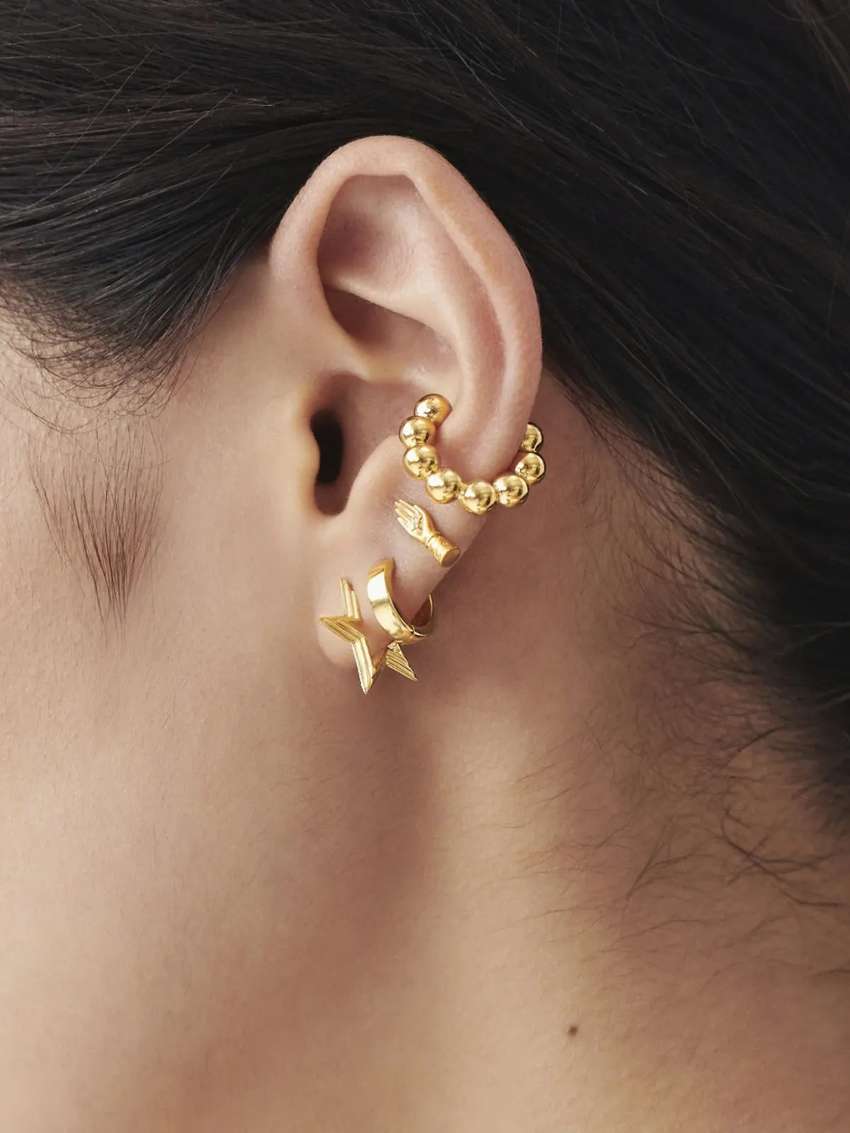 Missoma jewellery design, celestial mini ridge star huggies earrings
