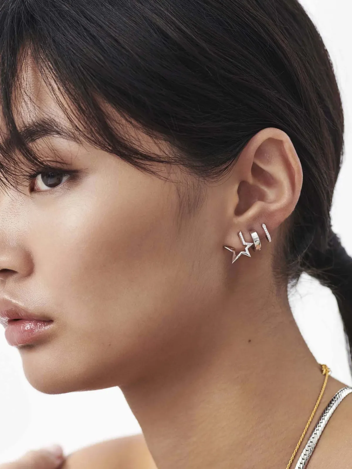 Missoma jewellery design, celestial pave star huggies earrings